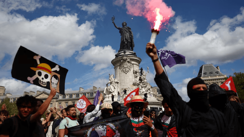 Anti-government protests flare in France over Macron’s austerity drive