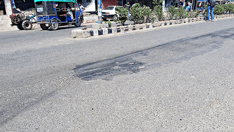 Road asphalt melts in heat in Chuadanga