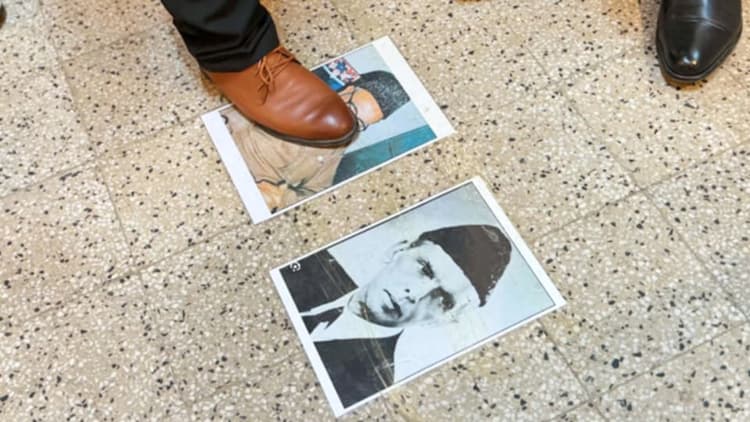 Students protest by trampling on images of Jinnah and Ghulam Azam at DUCSU