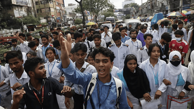 Security tightened near education building as protesters gather
