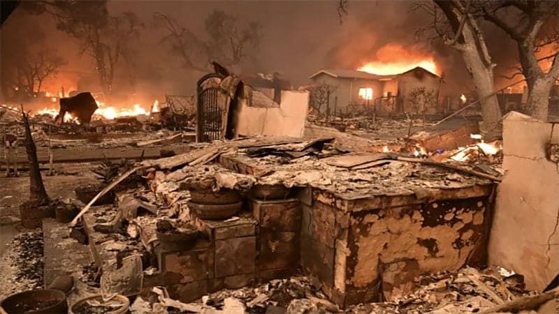 At least 5 dead as wildfires devastate upscale Los Angeles enclaves