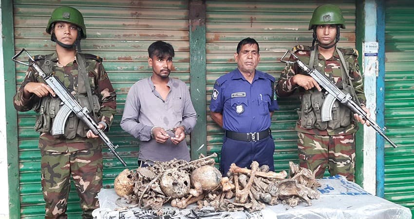 Youth detained with human skeletons hidden in school bags