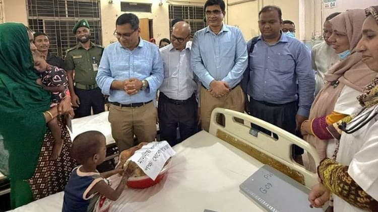 PM stands by measles-affected twin children