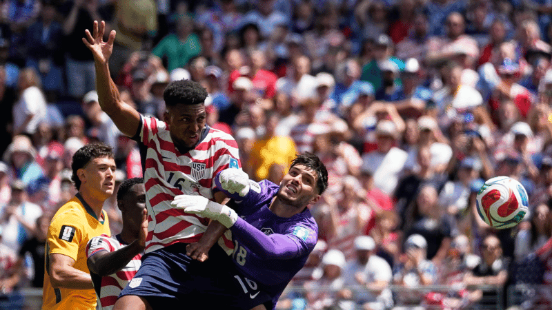USA blank Australia 2-0 to punch round of 32 ticket