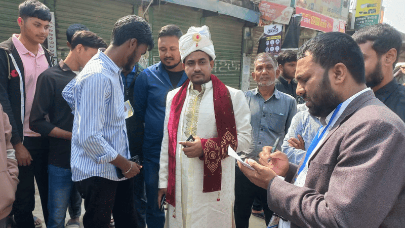 Groom arrives at polling centre in wedding attire