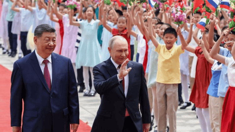 Putin and Xi sign 20 deals