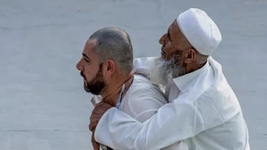 Son carrying elderly father in Hajj wins hearts online