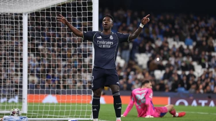 Vinicius double sends Real Madrid past Man City into Quarter-finals