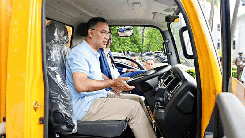 PM drives locally made sports car, covered van