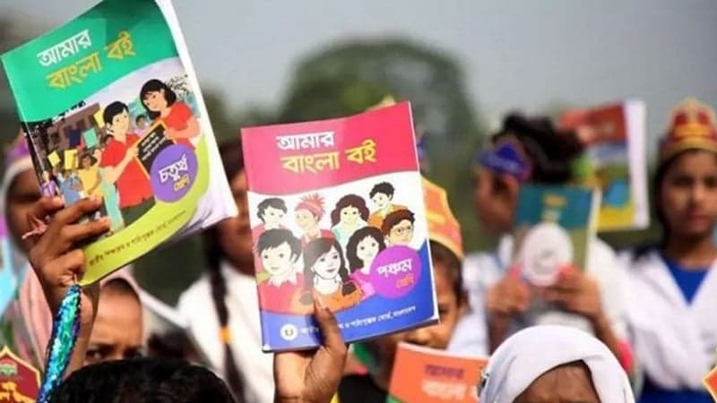 Textbooks being sold in open market, 2 held with trucks full of books