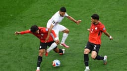 Iran hit back after an early blow to hold Egypt 1-1
