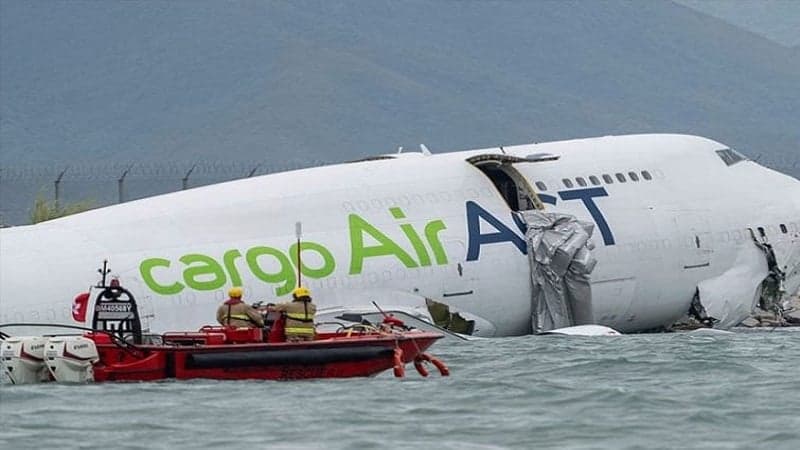 Cargo plane skids off runway in Hong Kong, 2 killed