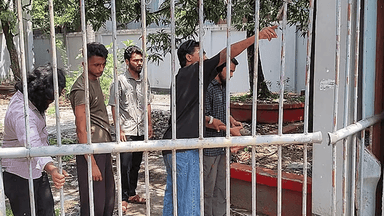 July movement activist' tag used to vandalise Amir Hossain Amu's house gate in Jhalakathi