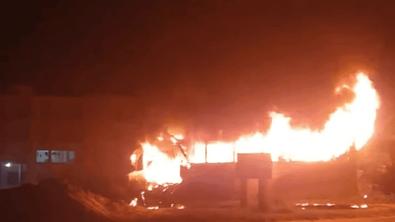 Seized bus catches fire beside highway police station in Faridpur