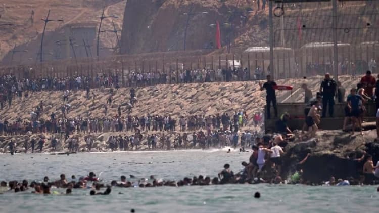 Death toll hits 57 as massive migrant rush overwhelms Spain's Ceuta border