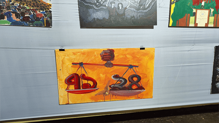 Artwork’s ‘71-24’ balance scale sparks debate at Rajshahi University