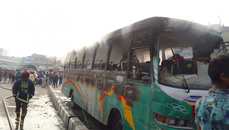 Bus torched in capital