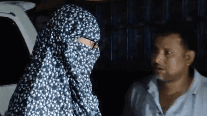 Youth disguised in burqa caught trying to jump fuel queue in Naogaon