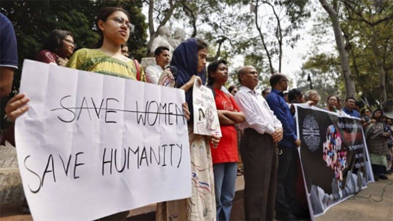 DU teachers, students protest against violence against women
