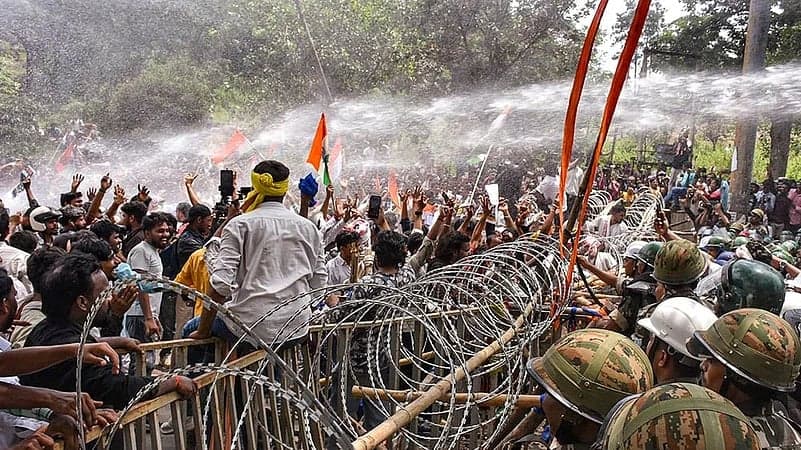 Police throw tear gas on students in Jharkhand, former exam chief arrested