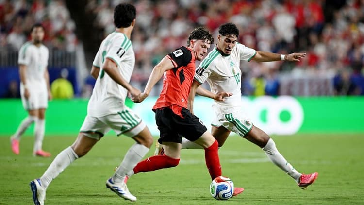 Six-goal thriller ends in joy for Algeria and Austria, tears for Iran
