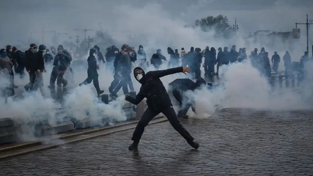 Almost 1,000 arrested in France as protesters and police clash in several cities