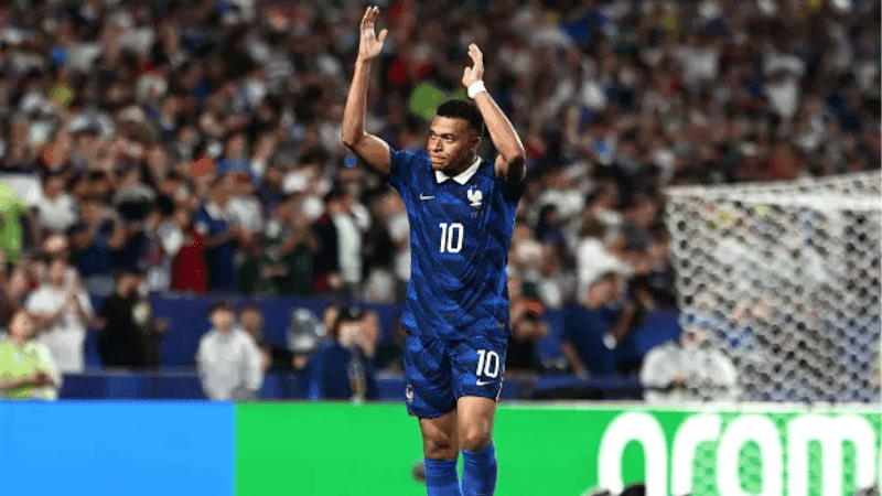 France rout Iraq 3–0 after storm delay