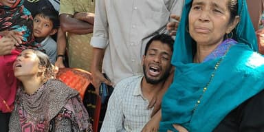 Woman, two children found throat slit in Cumilla home