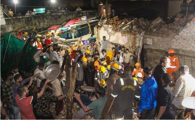 9 dead, many trapped in multi-stored building collapse in India