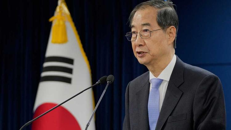 South Korean court reinstates impeached PM as acting leader