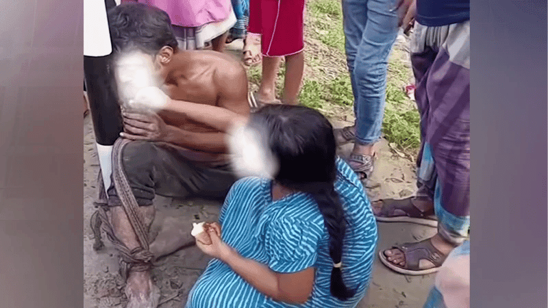 Little girl feeds tea-bread to father tied to post all night, released after video spreads