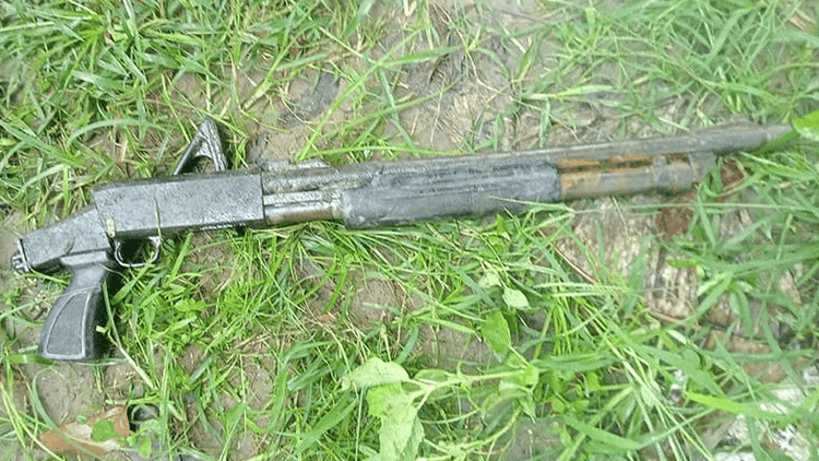 Looted police shotgun recovered from pond by fishermen