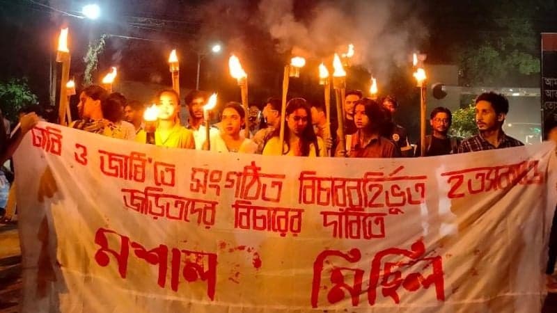JU students hold torchlight procession protesting recent killings