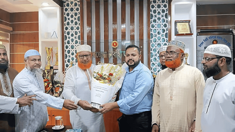 Jamaat MP criticised for welcoming UNO with flowers at office