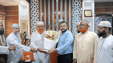 Jamaat MP criticised for welcoming UNO with flowers at office