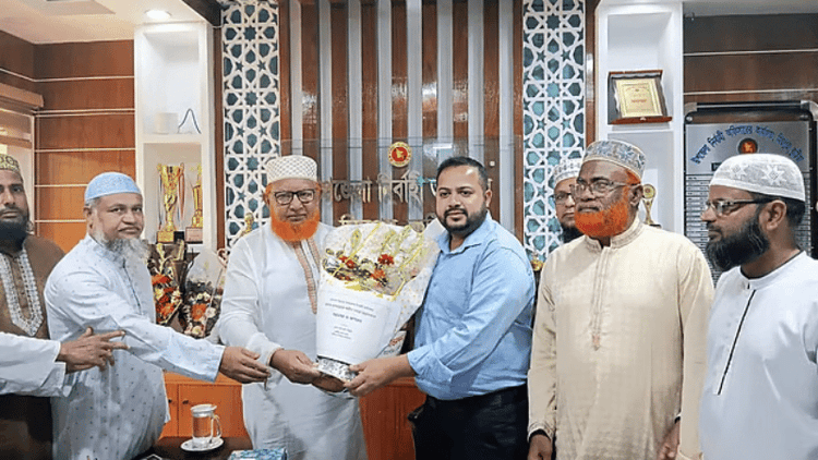 Jamaat MP criticised for welcoming UNO with flowers at office