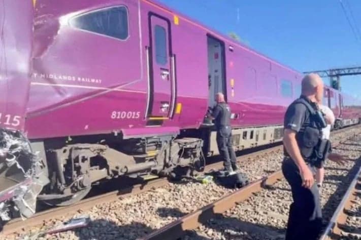 Train collision in England kills driver, injures 90