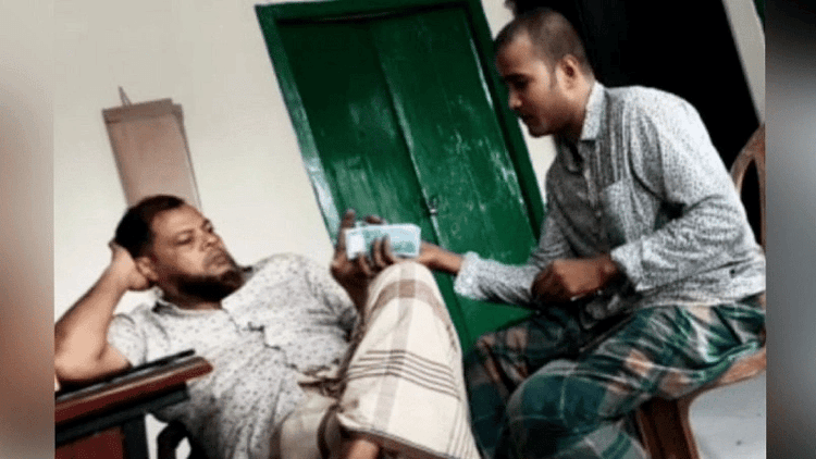 Hidden camera captures naval police collecting monthly extortion from fishermen