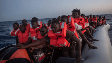 At least 50 killed as refugee boat catches fire off Libyan coast