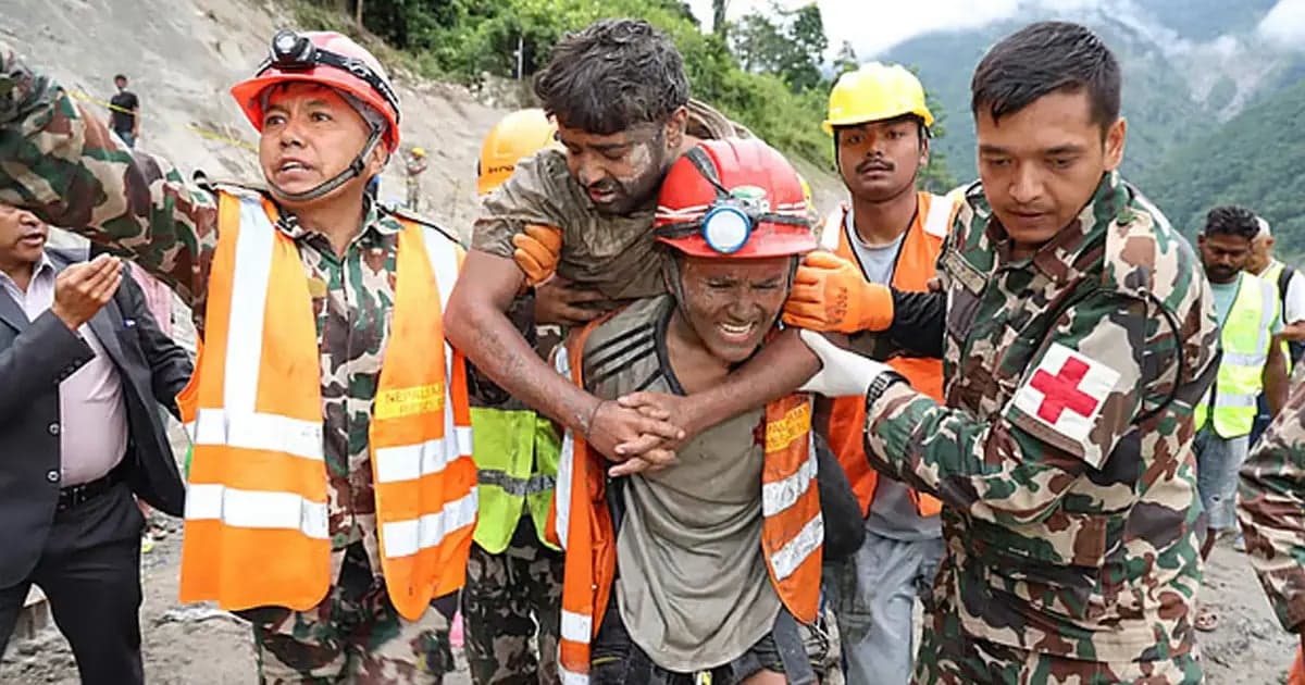 Two workers rescued alive from Nepal tunnel nine days after floods