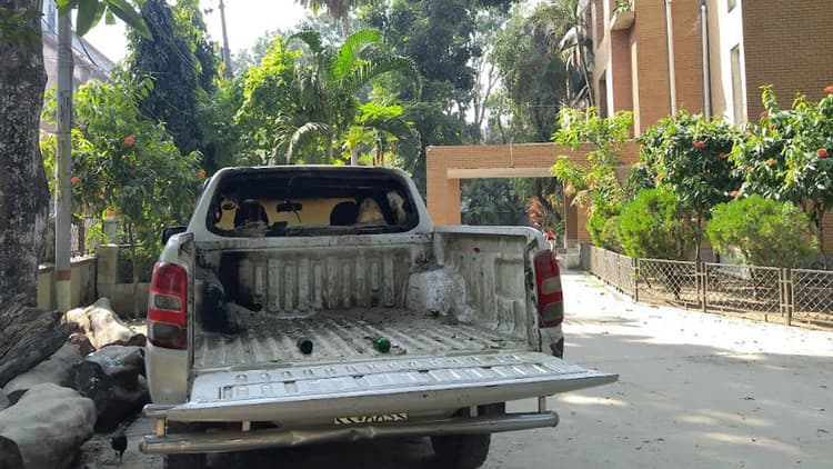 Car catches fire in petrol bomb attack at public works office in Gopalganj