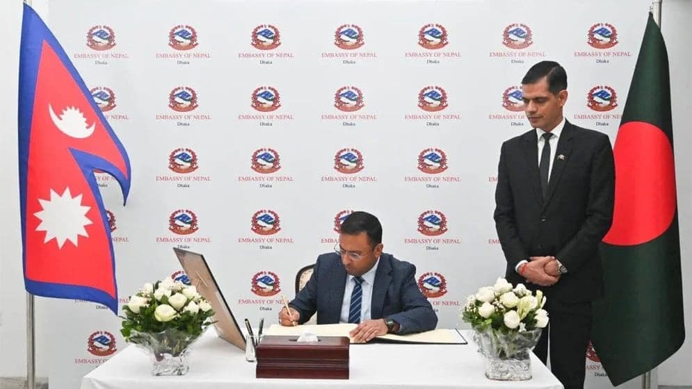 Humayun Kabir signs condolence book at Nepal Embassy
