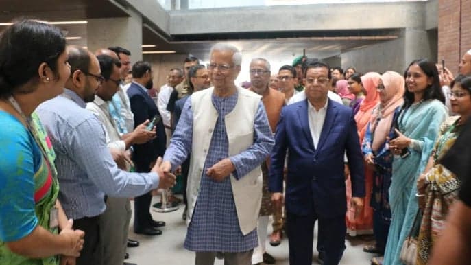 Dr Yunus returns to workplace after 18 months