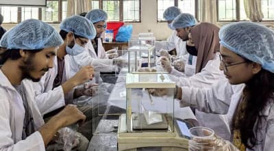 SUST students preparing 5000 packets of oral saline