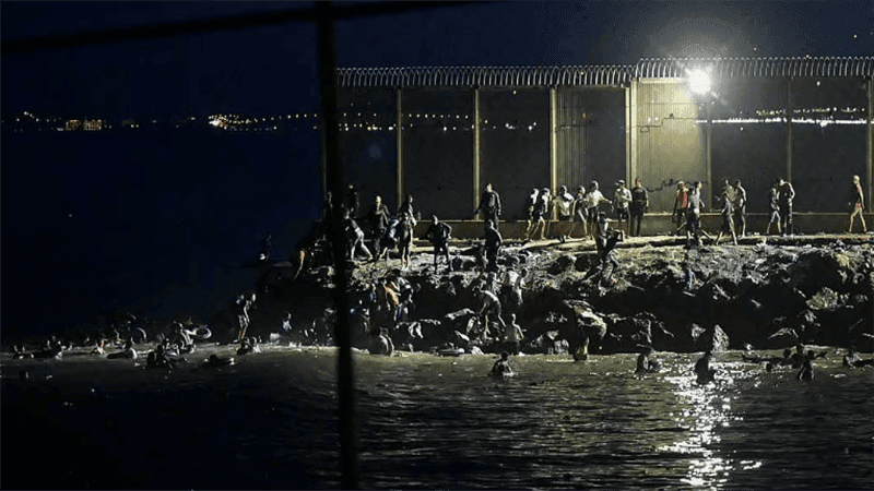 Around 60,000 migrants cross into Spain's Ceuta in 24 hours, 34 dead