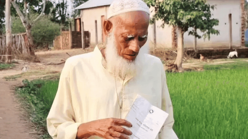 Old man struggles to prove he's alive after mistaken death record in Netrakona