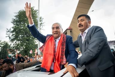 Nepal's ex-PM returns despite arrest warrant