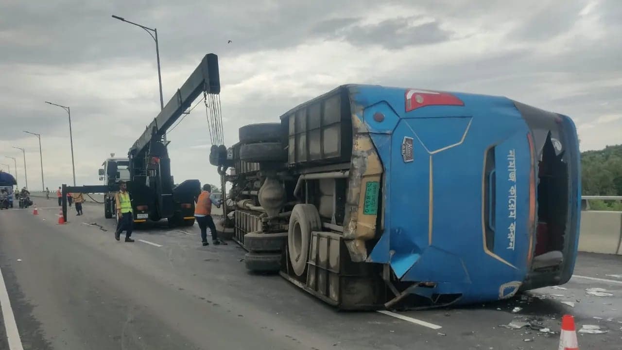 Bus overturns after losing control on Padma Bridge slope, 10 injured
