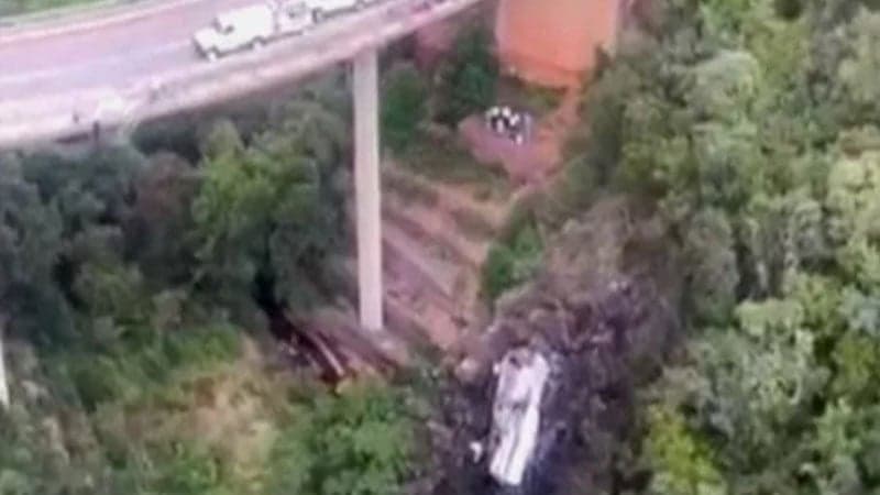 Bus-plunges-off-bridge