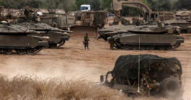Thousands of Israeli tanks amassed at Gaza border